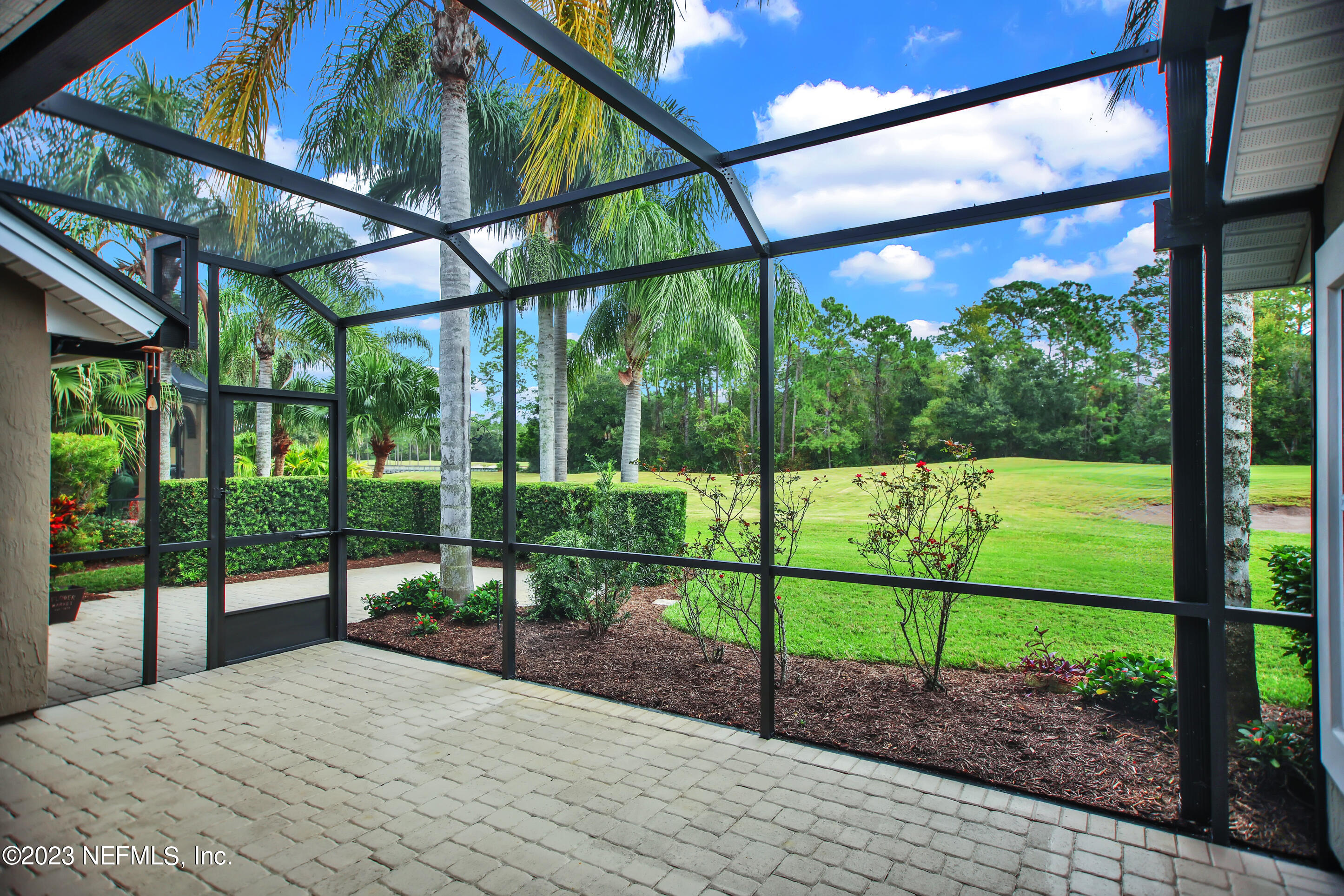 944 Oxford Drive St. Augustine, FL 32084 - Photo 41 of 58 REAR SCREENED LANAI - VIEW TO GOLF!