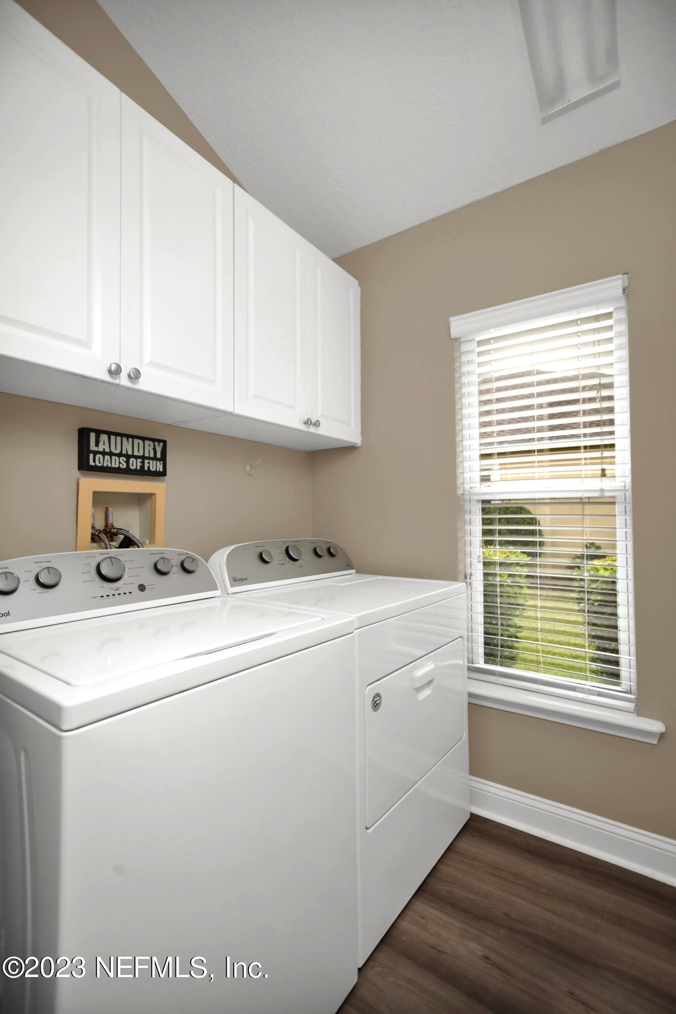 944 Oxford Drive St. Augustine, FL 32084 - Photo 43 of 58 a utility room with dryer and washer