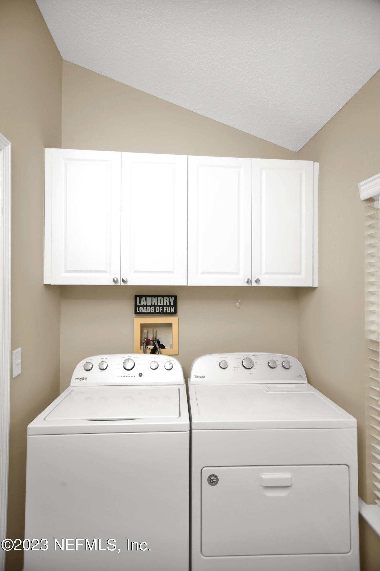 944 Oxford Drive St. Augustine, FL 32084 - Photo 44 of 58 a utility room with dryer and washer