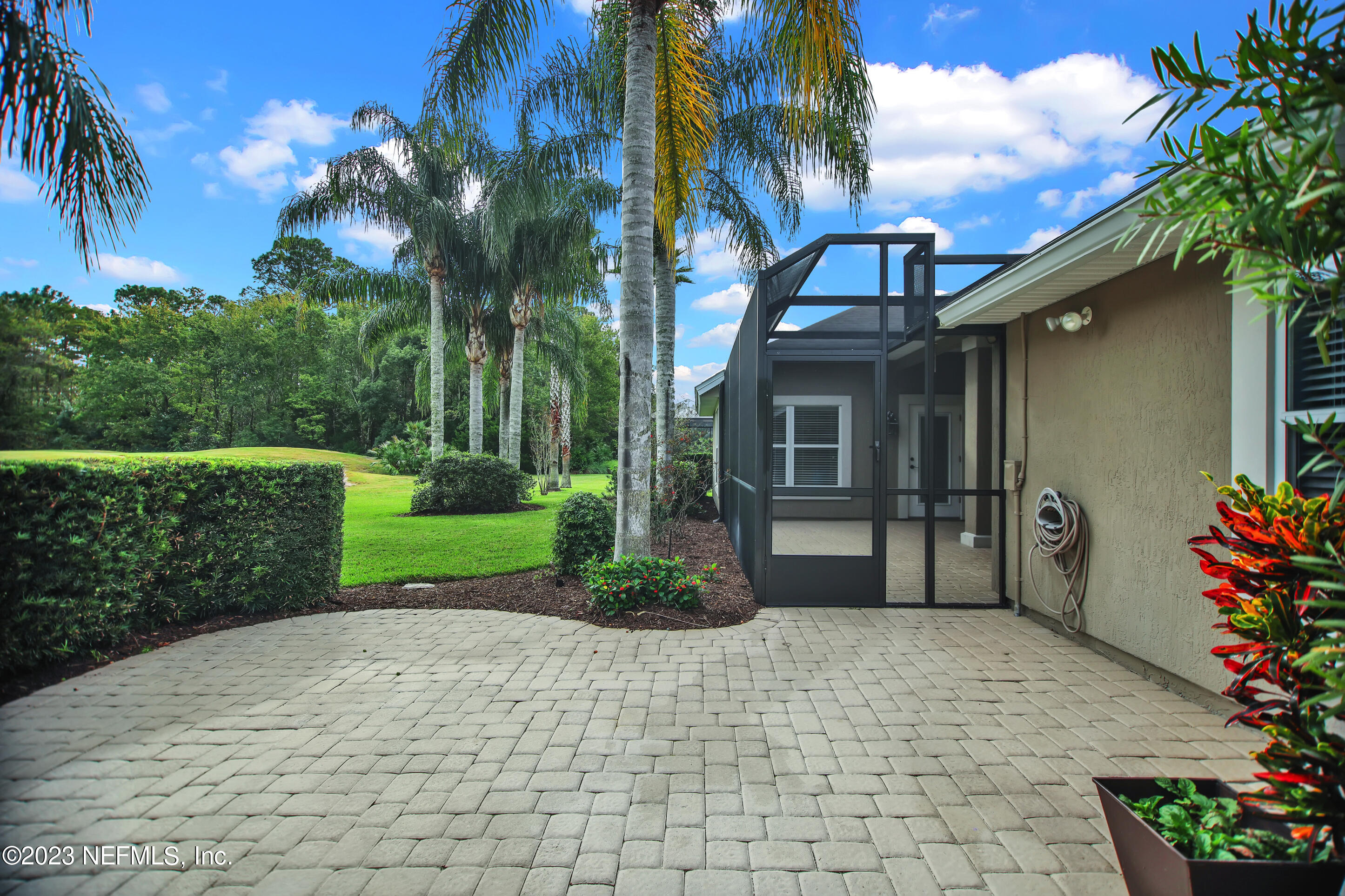 944 Oxford Drive St. Augustine, FL 32084 - Photo 48 of 58 a front view of a house with garden