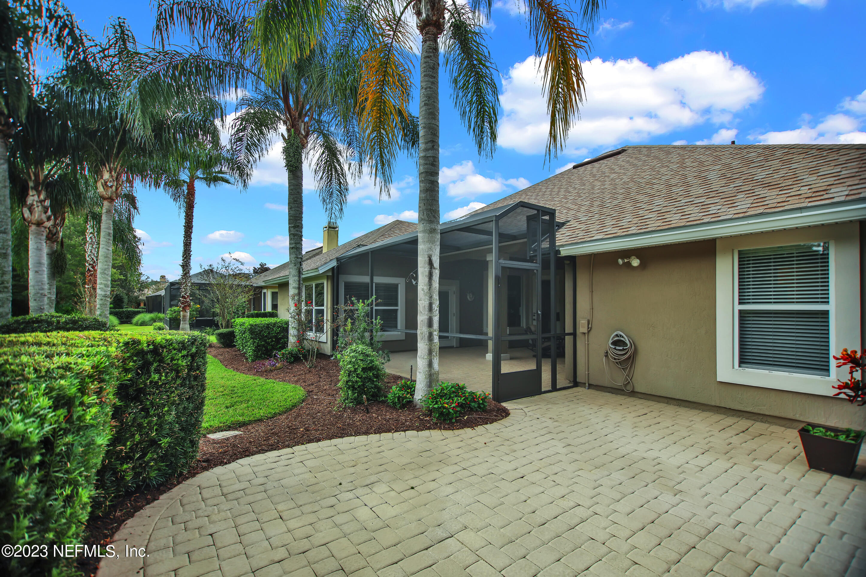 944 Oxford Drive St. Augustine, FL 32084 - Photo 49 of 58 a view of a house with a yard