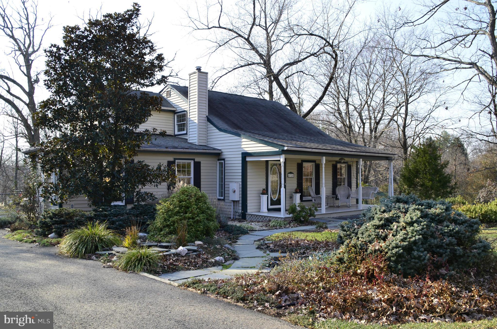 8725 Pohick Road Springfield, VA 22153 - Photo 2 of 22 A flagstone walkway leads to the front porch!