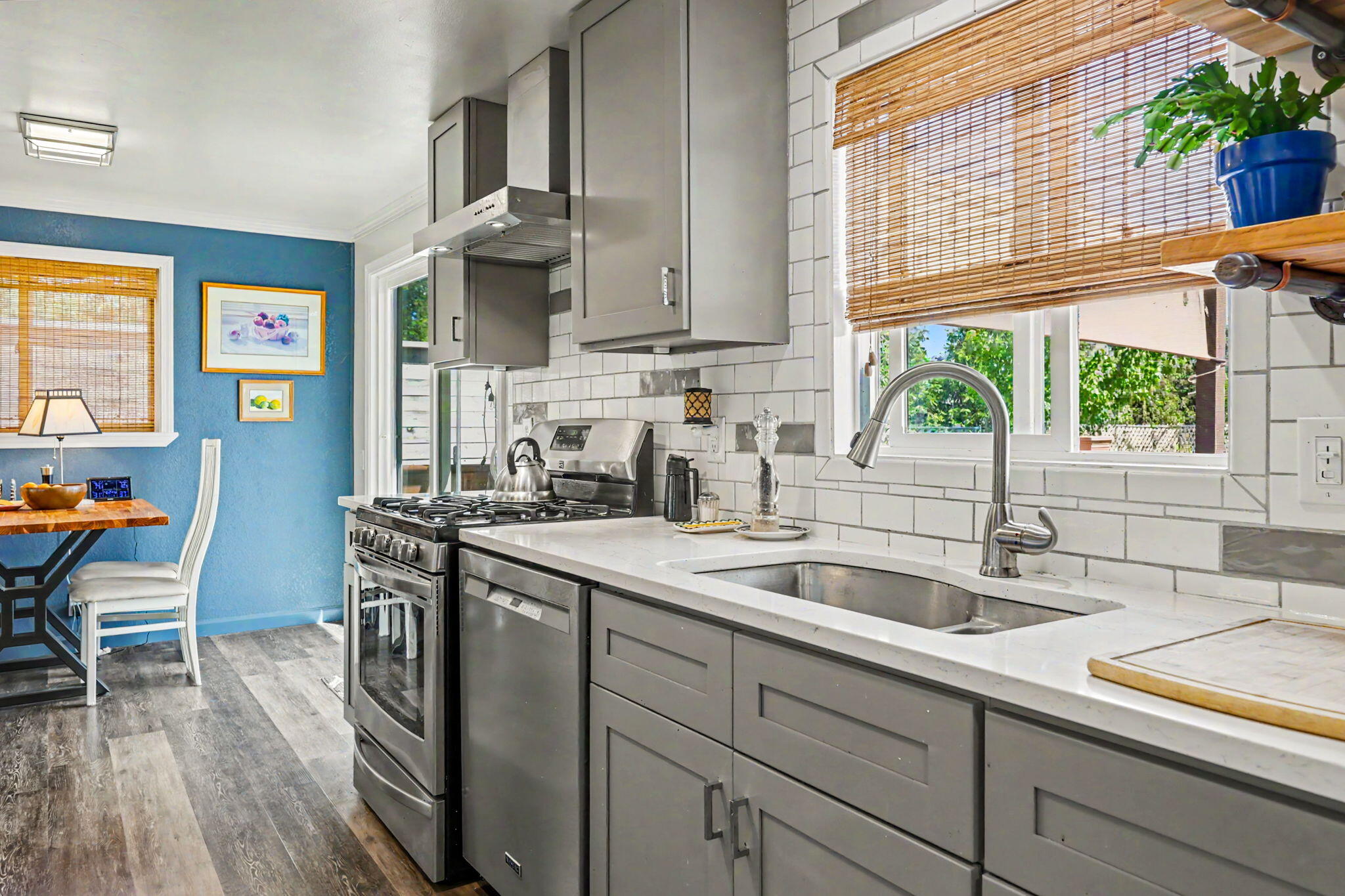 145 Highway 234 Eagle Point, OR 97524 - Photo 14 of 43 a kitchen with stainless steel appliances a sink a counter space and a window
