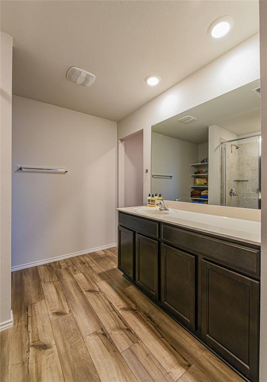 348 Jacquard Court Troy, TX 76579 - Photo 10 of 19 a spacious bathroom with a sink and a mirror