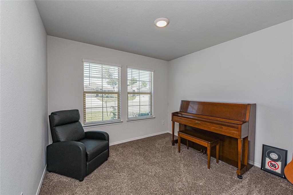348 Jacquard Court Troy, TX 76579 - Photo 12 of 19 a room with furniture and a window
