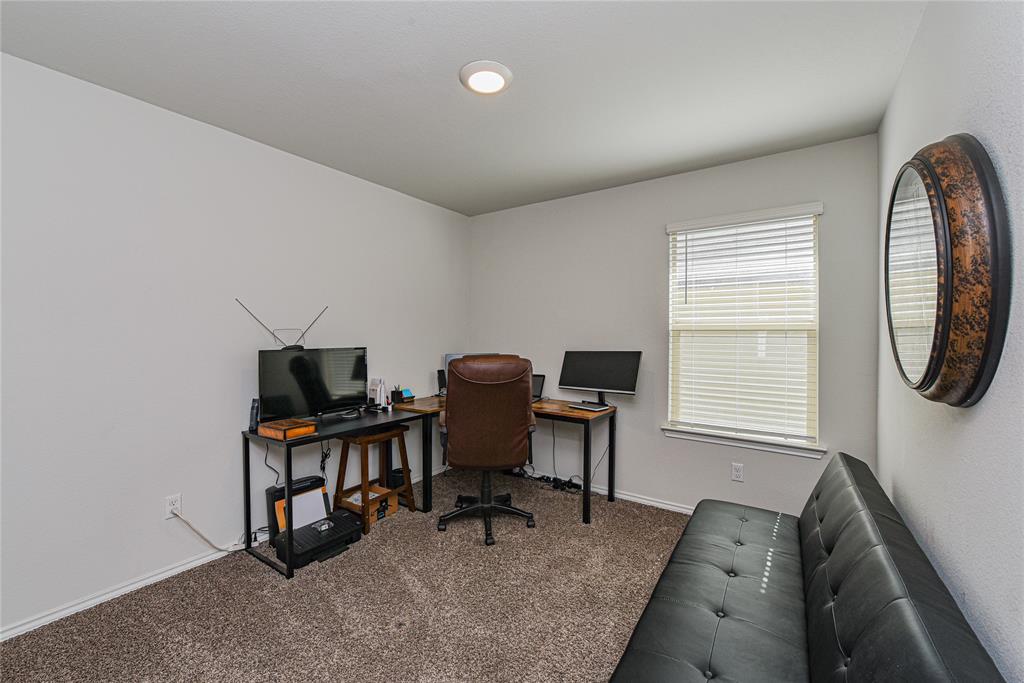 348 Jacquard Court Troy, TX 76579 - Photo 13 of 19 a view of a workspace with furniture and a window