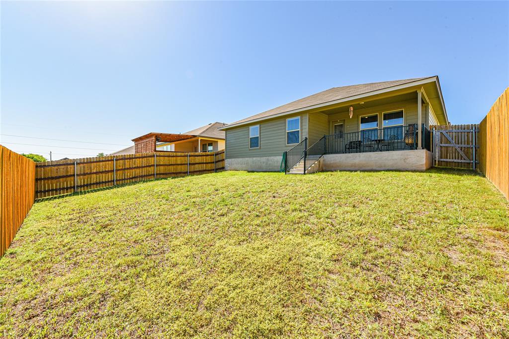 348 Jacquard Court Troy, TX 76579 - Photo 16 of 19 a bathroom with a sink and a mirror