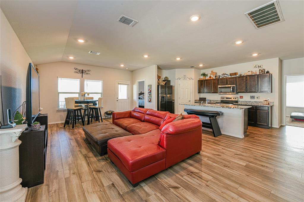 348 Jacquard Court Troy, TX 76579 - Photo 2 of 19 a living room kitchen with furniture and a wooden floor