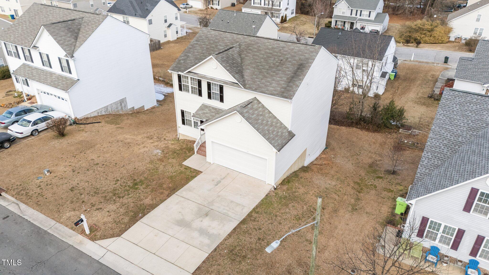7041 Spanglers Spring Way Raleigh, NC 27610 - Photo 38 of 44 6-web-or-mls-DJI_20250124123140_0984_D