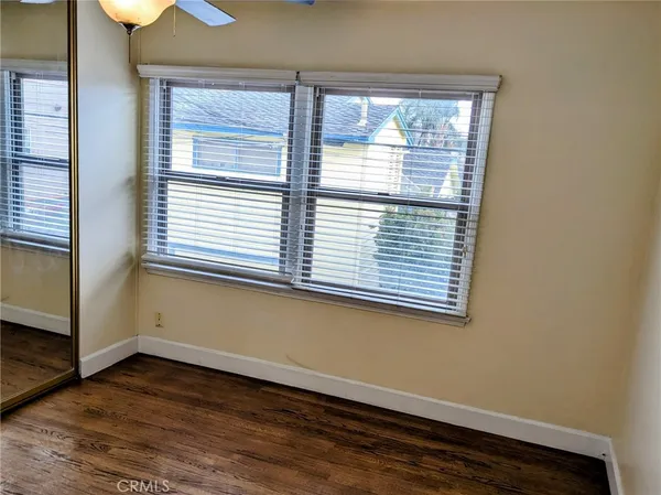 a view of a room that has a window in it