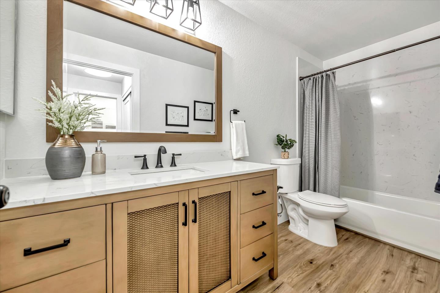 1415 Alma Loop San Jose, CA 95125 - Photo 15 of 25 a bathroom with a sink a toilet and shower