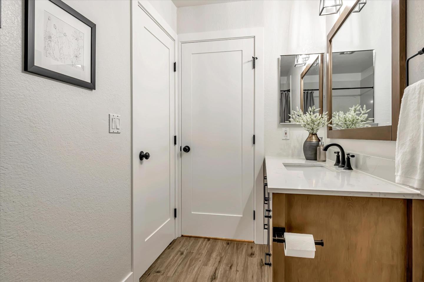 1415 Alma Loop San Jose, CA 95125 - Photo 16 of 25 a bathroom with a sink and a mirror