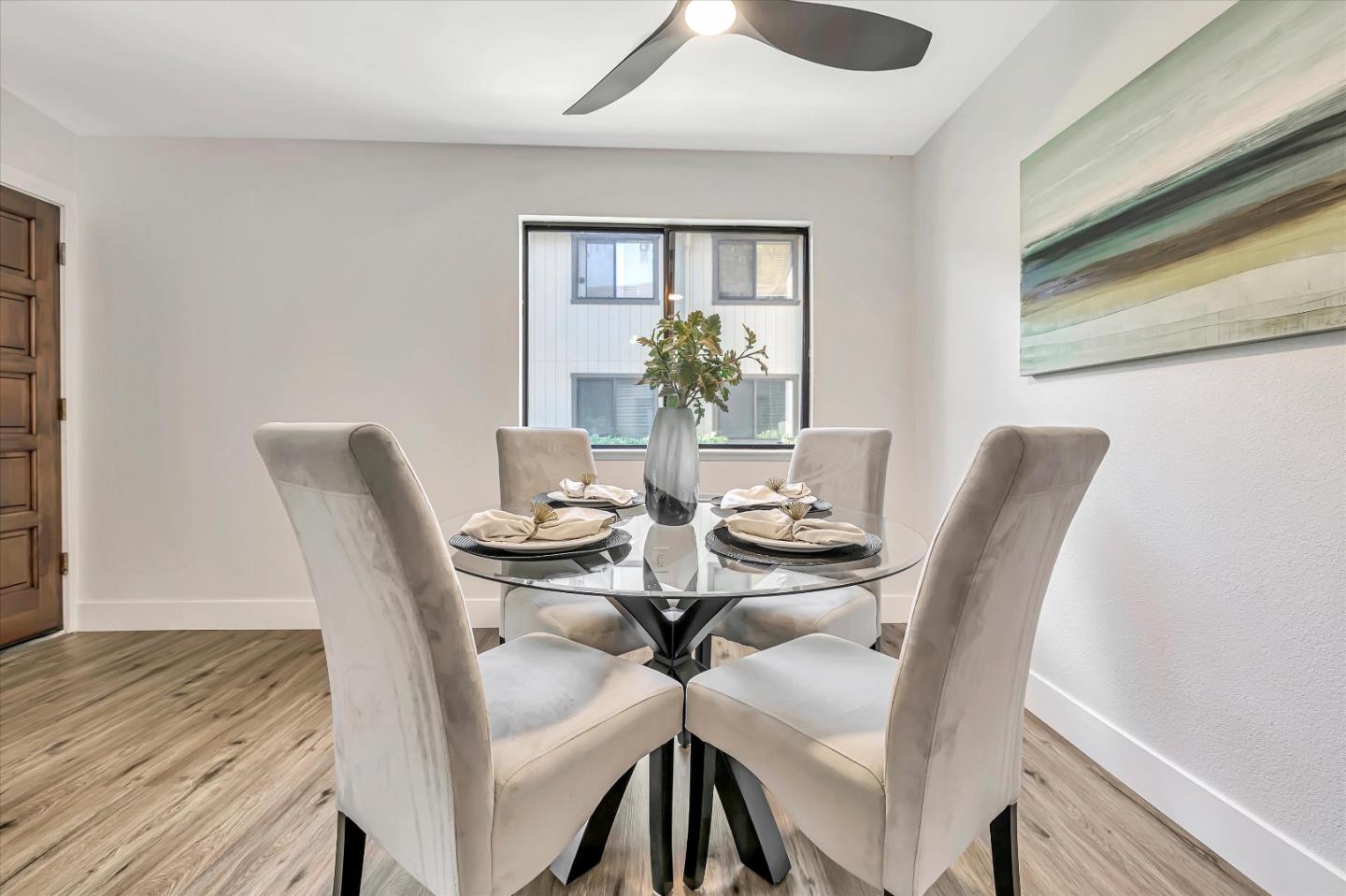 1415 Alma Loop San Jose, CA 95125 - Photo 10 of 25 a view of a dining room with furniture and wooden floor