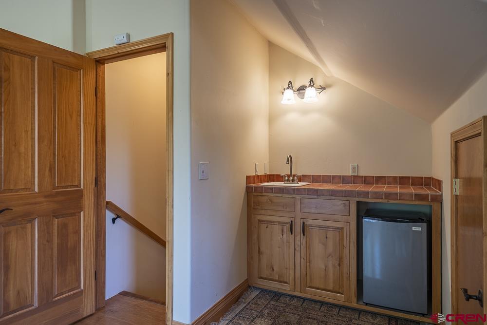970 Red Rock Road Durango, CO 81301 - Photo 30 of 35 a view of a kitchen from the hallway