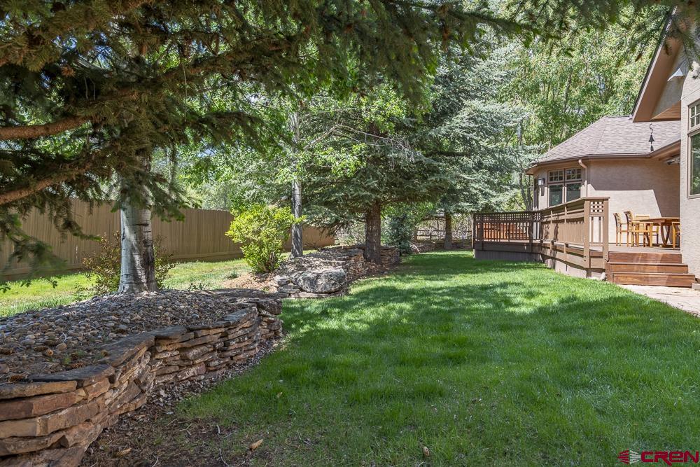 970 Red Rock Road Durango, CO 81301 - Photo 34 of 35 a view of a backyard with a garden