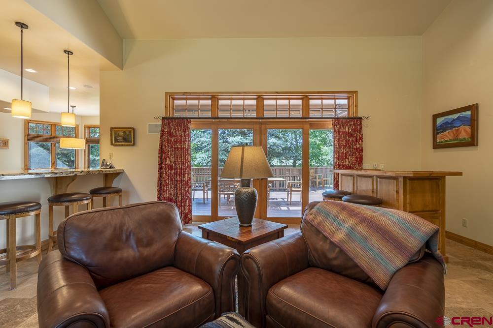 970 Red Rock Road Durango, CO 81301 - Photo 7 of 35 a bedroom with furniture and a window