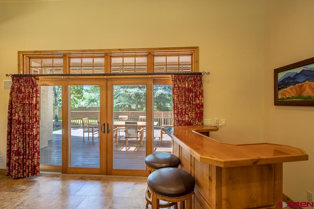 970 Red Rock Road Durango, CO 81301 - Photo 8 of 35 a living room with a large window and furniture