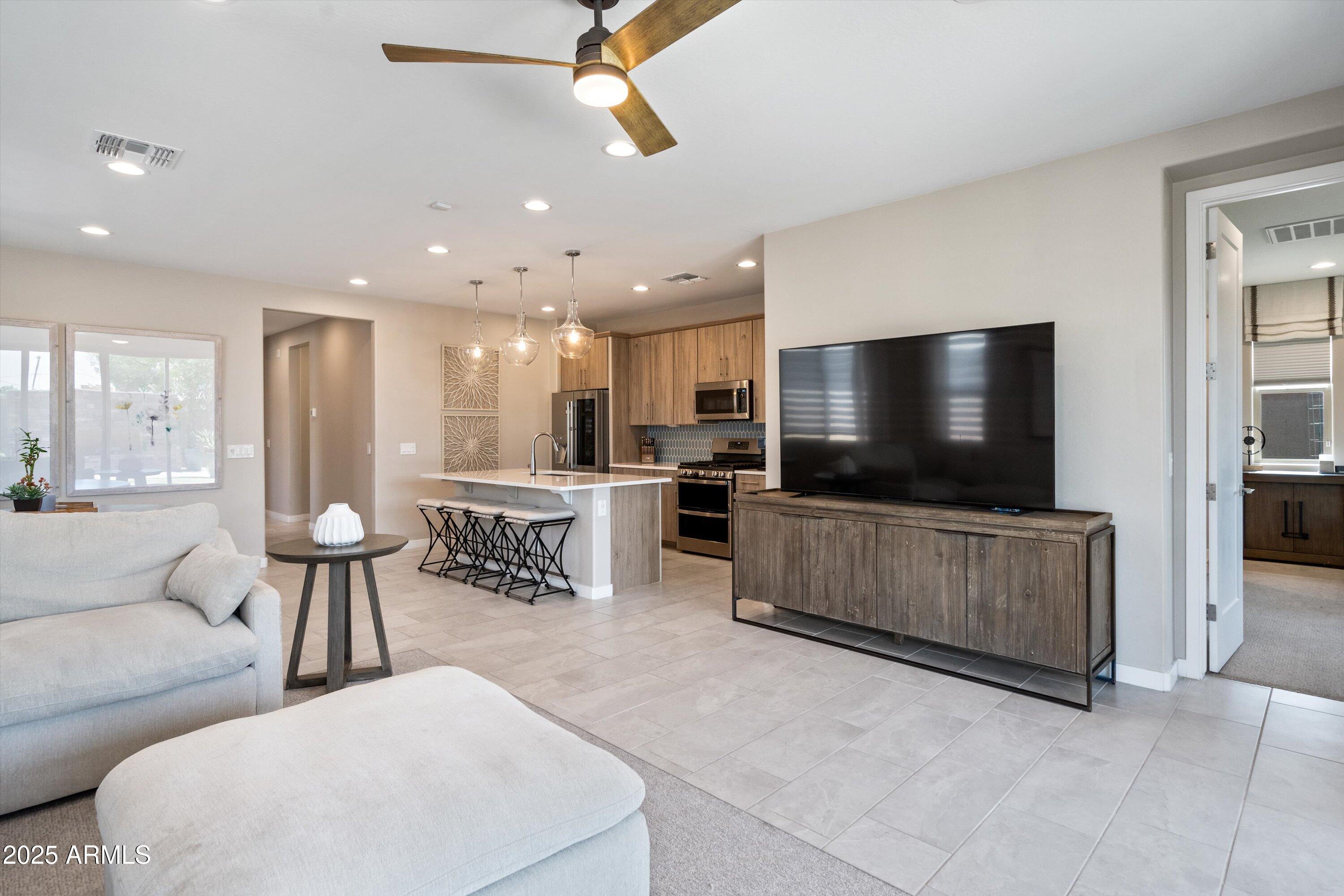614 East Piedmont Road Phoenix, AZ 85042 - Photo 17 of 63 Family Room to Kitchen