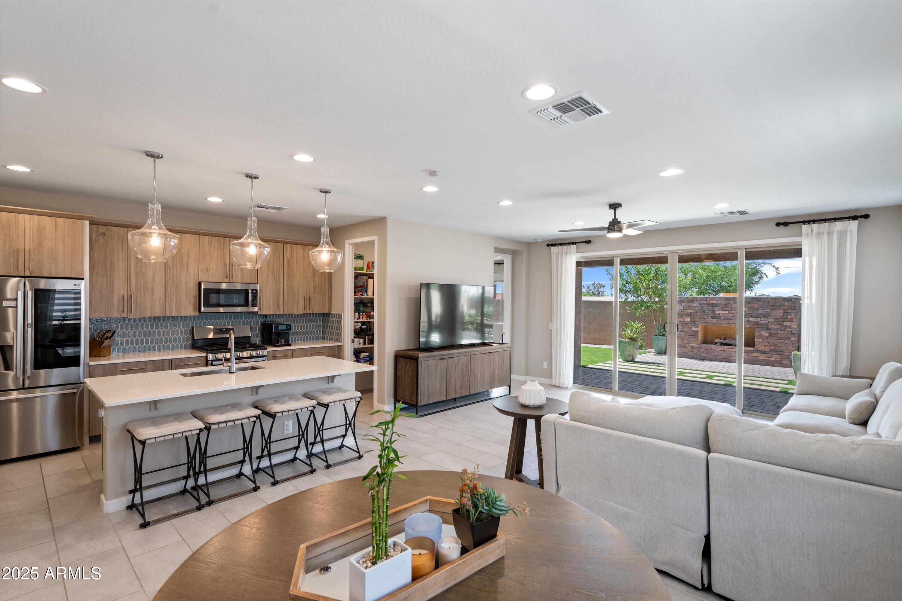 614 East Piedmont Road Phoenix, AZ 85042 - Photo 9 of 63 Dining to Kitchen