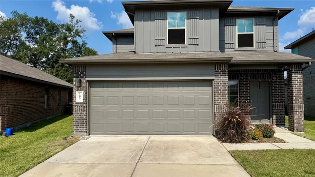a view of house with outdoor space and porch