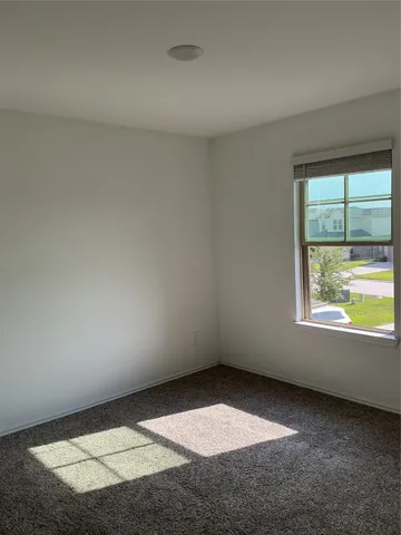 a house view with a garden space