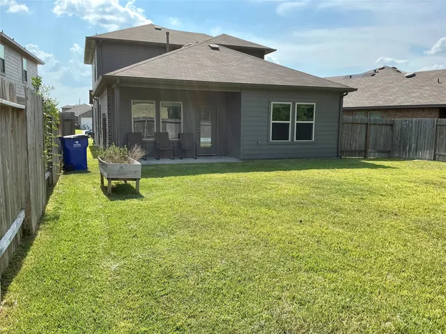 a house view with a garden space
