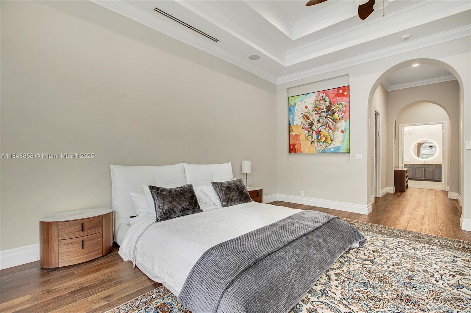 741 Ranch Road Weston, FL 33326 - Photo 16 of 35 a bedroom with a bed and a chandelier