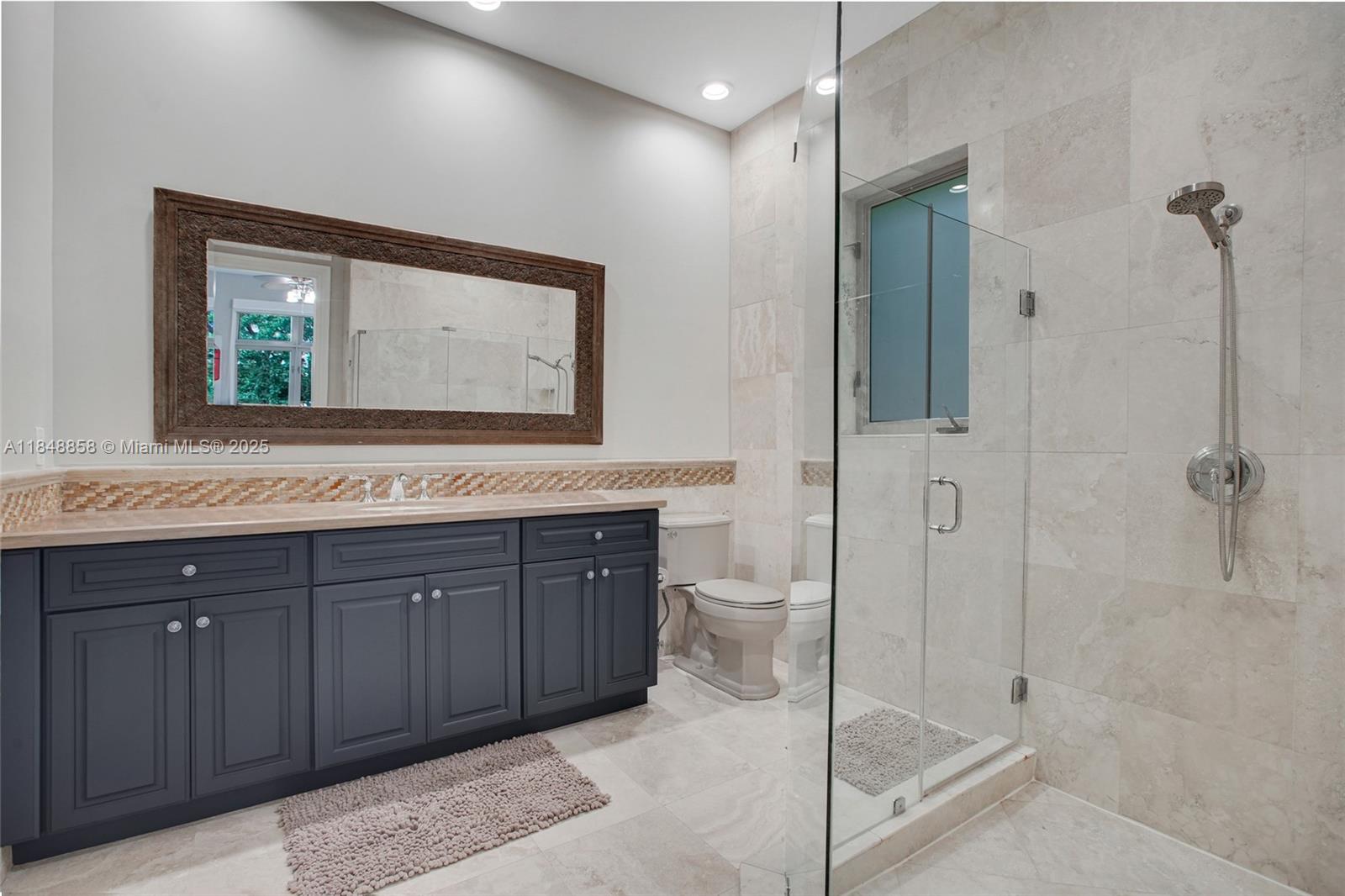 741 Ranch Road Weston, FL 33326 - Photo 20 of 35 a bathroom with a granite countertop sink mirror and toilet