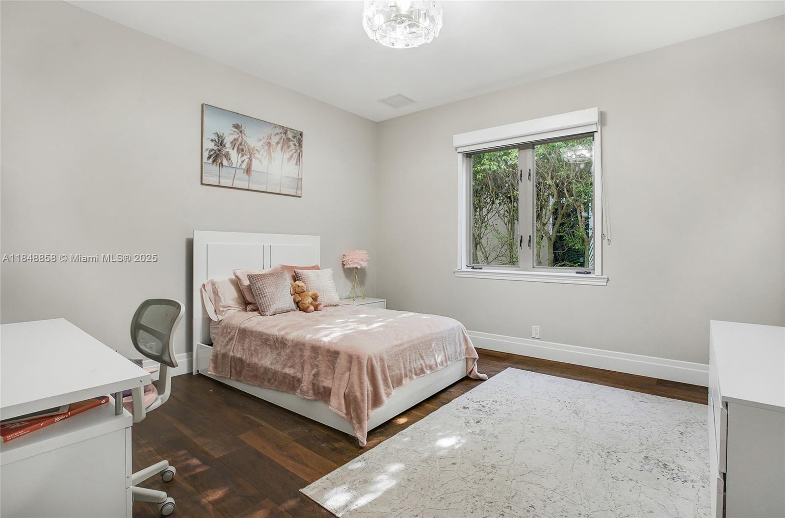 741 Ranch Road Weston, FL 33326 - Photo 23 of 35 a bedroom with a bed and a window