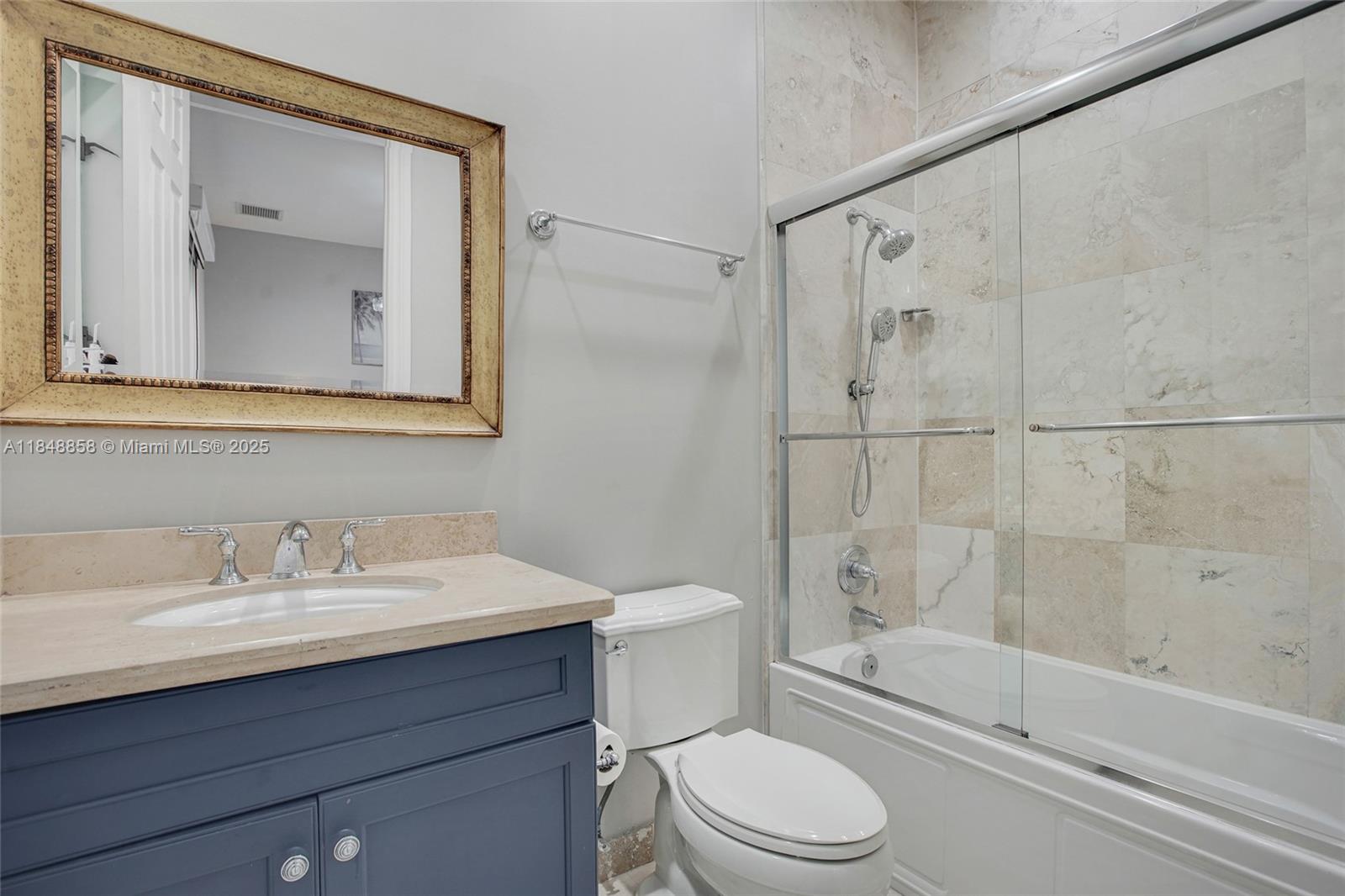 741 Ranch Road Weston, FL 33326 - Photo 24 of 35 a bathroom with a sink a toilet and shower