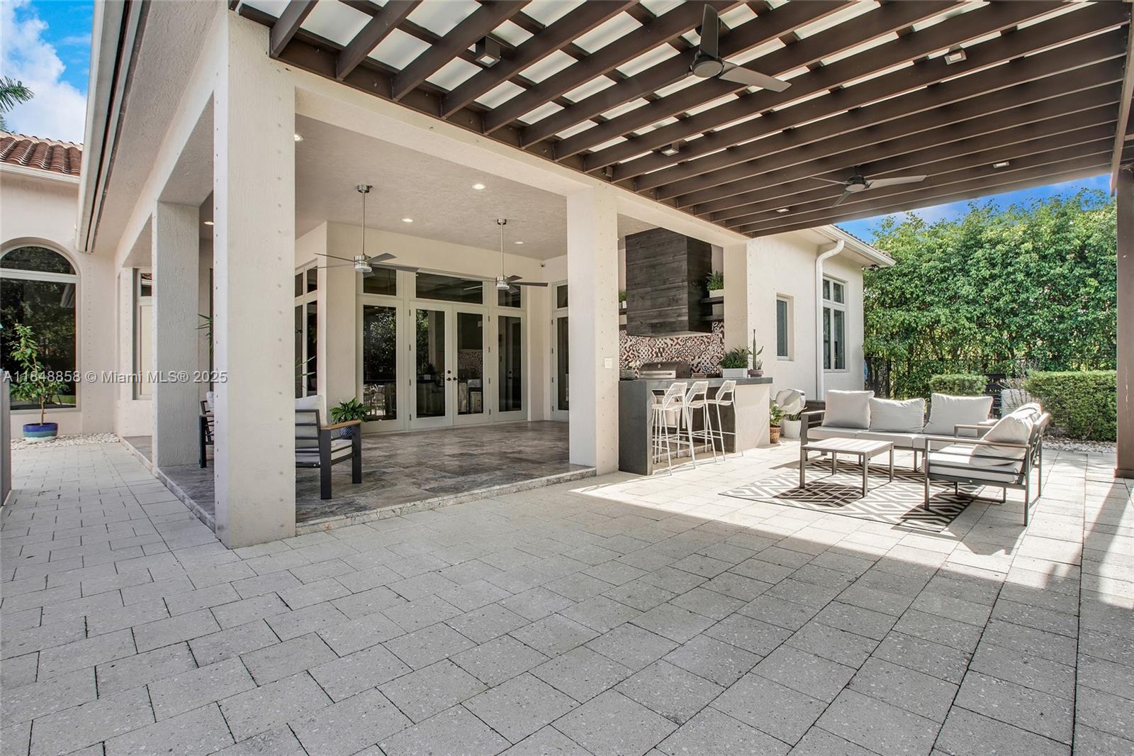 741 Ranch Road Weston, FL 33326 - Photo 29 of 35 a view of a hallway with seating space