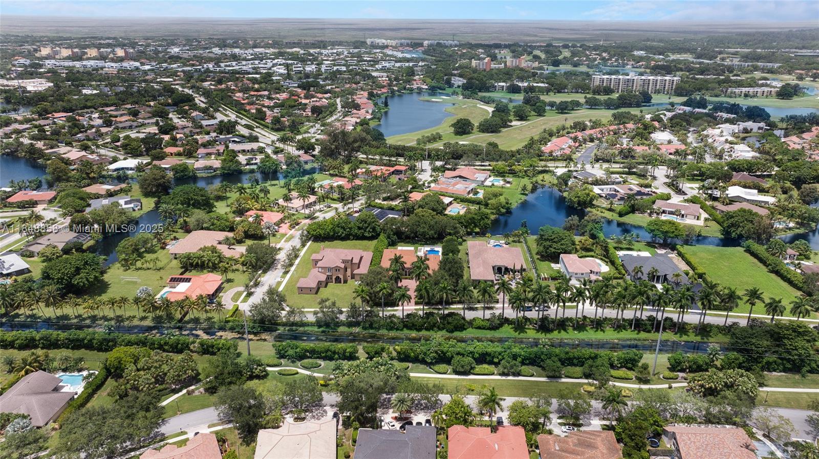 741 Ranch Road Weston, FL 33326 - Photo 32 of 35 an aerial view of a city with lots of residential buildings