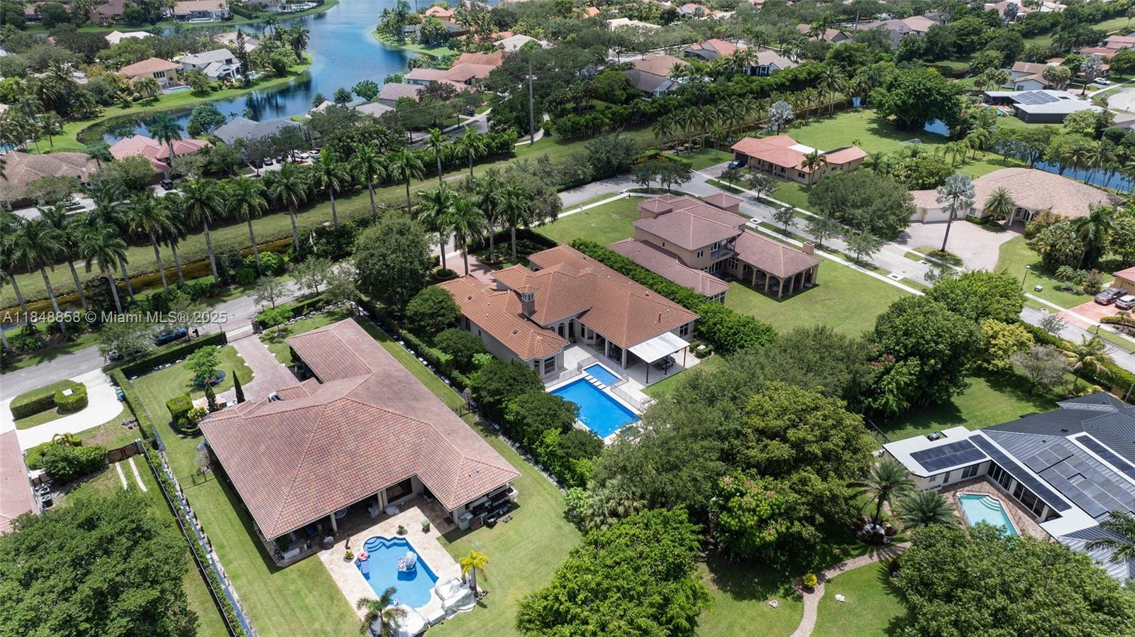 741 Ranch Road Weston, FL 33326 - Photo 33 of 35 an aerial view of residential houses with outdoor space