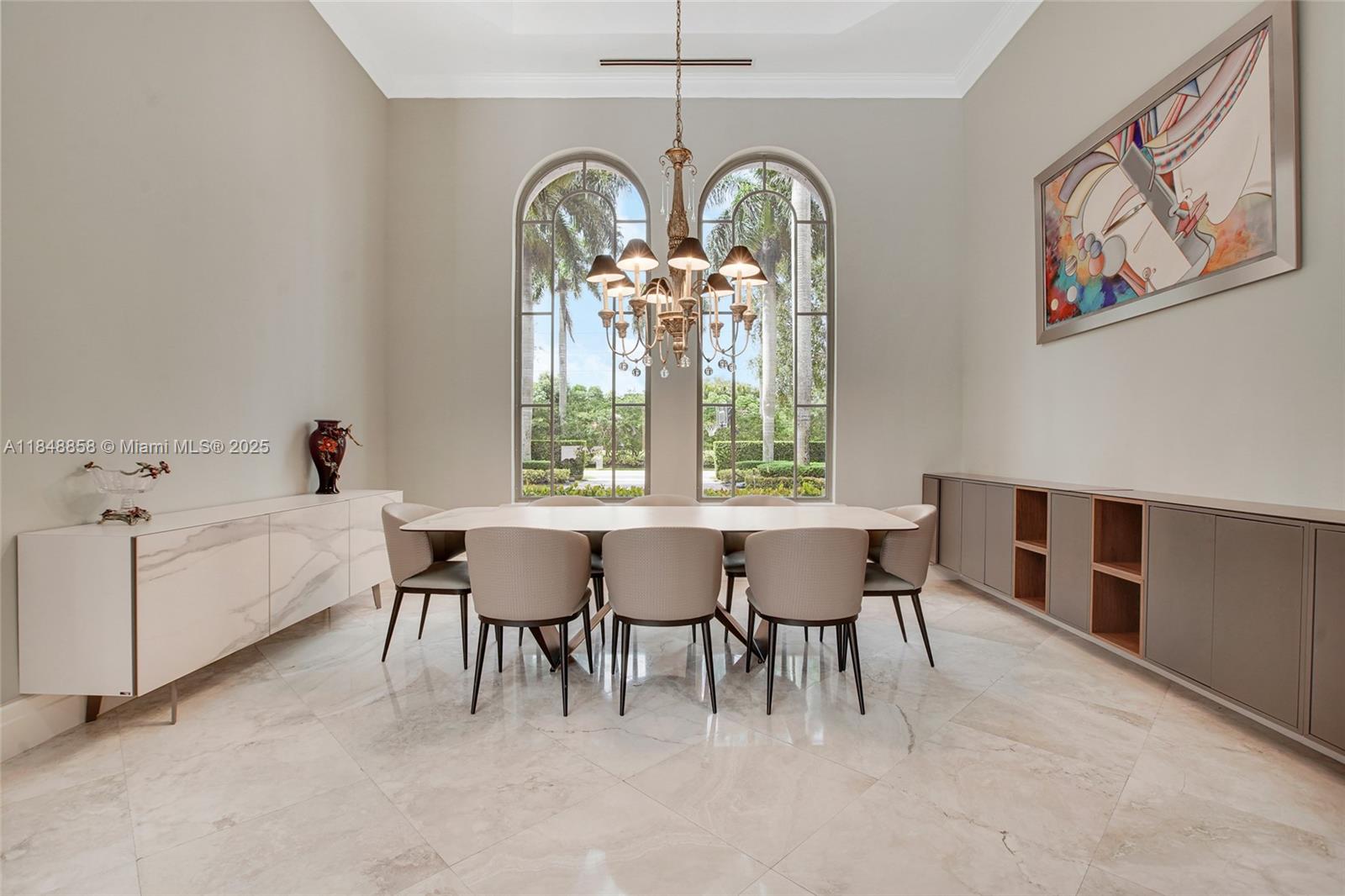 741 Ranch Road Weston, FL 33326 - Photo 4 of 35 a dining room with furniture and a large window
