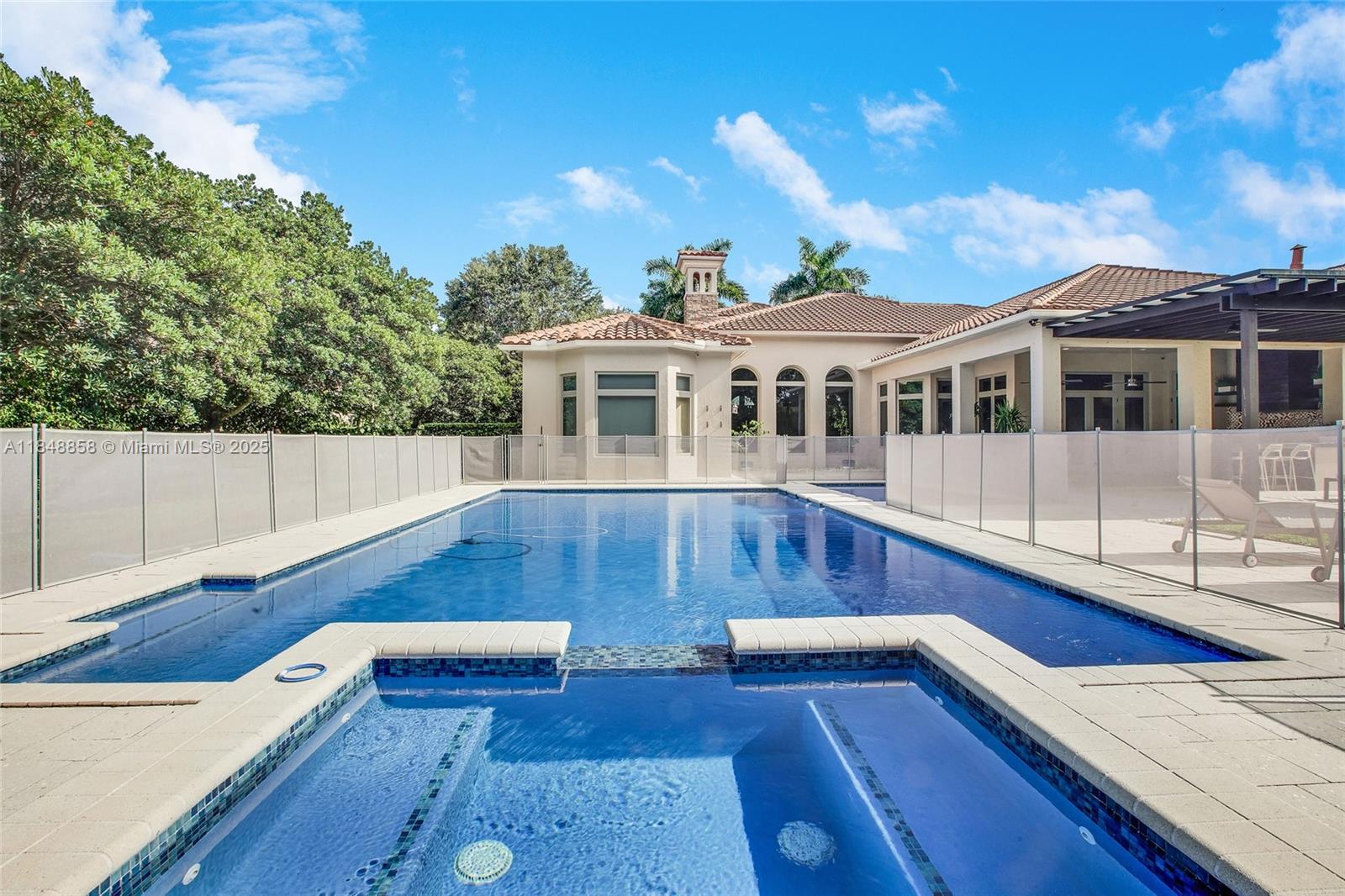 741 Ranch Road Weston, FL 33326 - Photo 8 of 35 a view of a house with wooden floor and a swimming pool