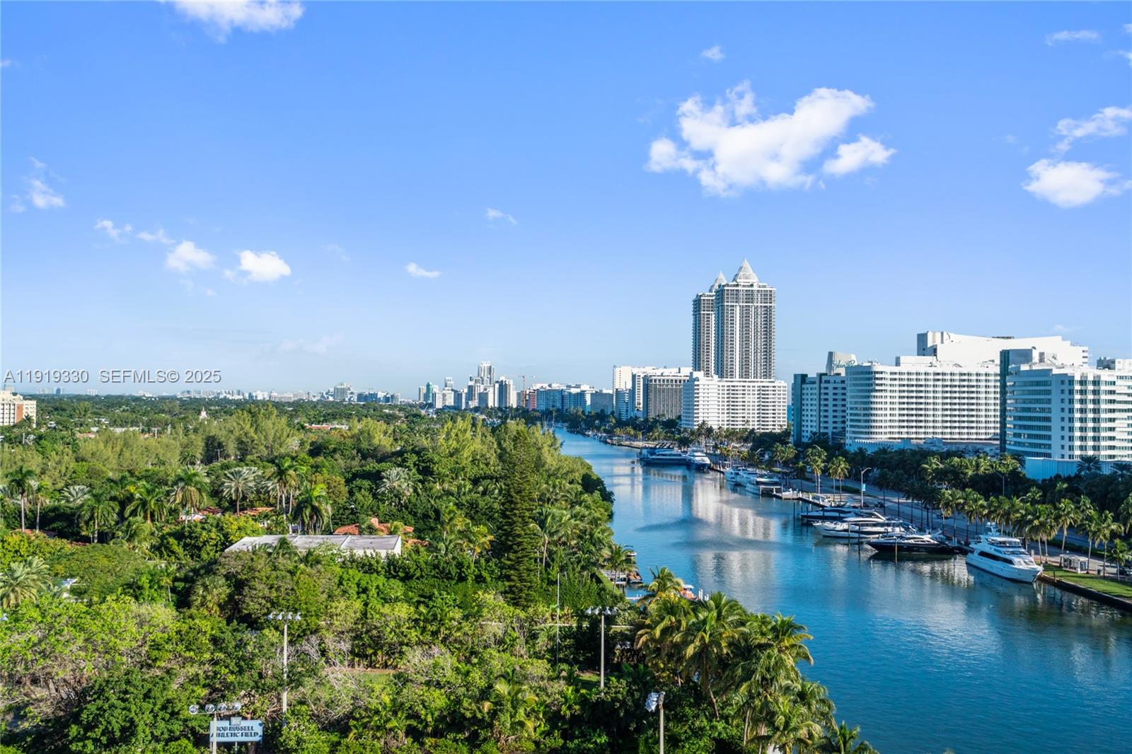 4101 Pine Tree Drive, Unit 1112 Miami Beach, FL 33140 - Photo 60 of 62 a view of a city with tall buildings