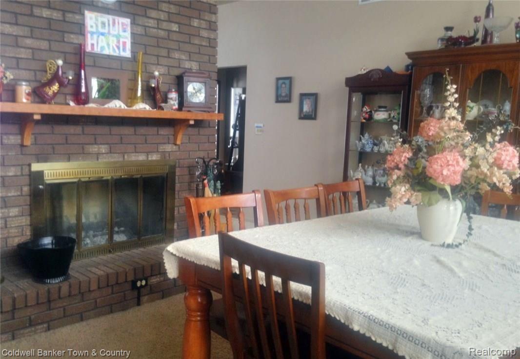 8045 Morrish Road Flushing, MI 48433 - Photo 5 of 18 FireplaceDining.jpg