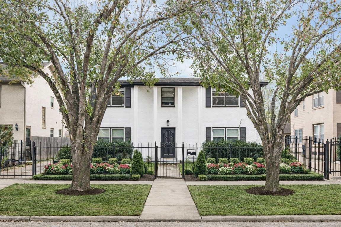 2614 Cleburne Street Houston, TX 77004 - Photo 2 of 17 a front view of a house with yard and green space