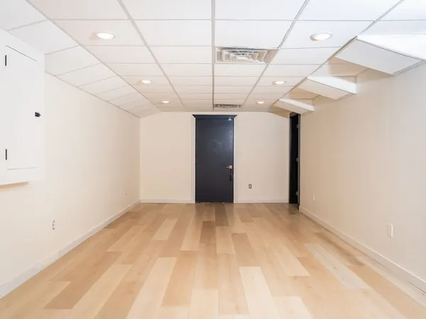 a view of a room with a hallway