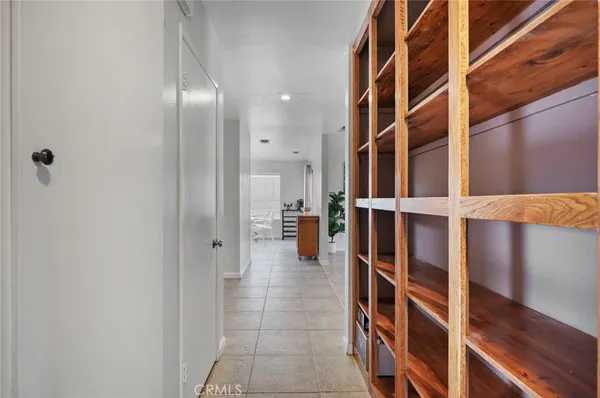 a room with a bed and a window