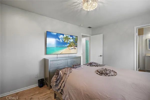 a bathroom with a sink vanity and mirror