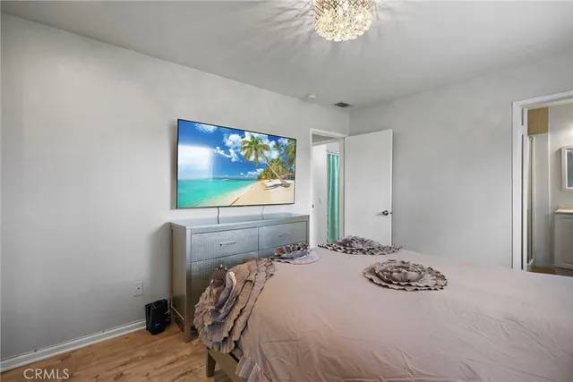 a bathroom with a sink vanity and mirror