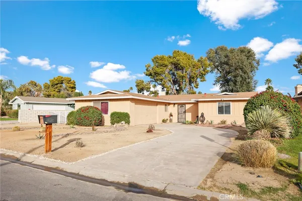 front view of a house with a patio