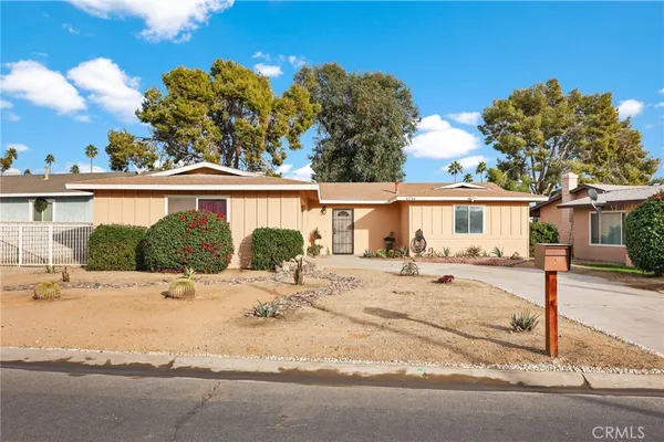 a view of a house with a swimming pool