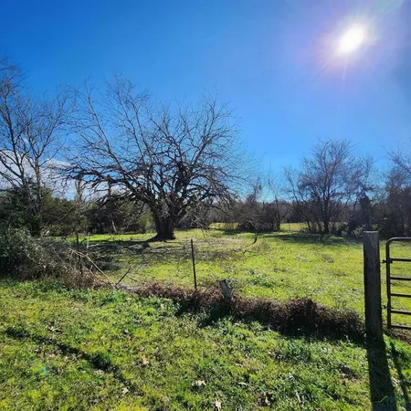 a view of an outdoor space and a yard