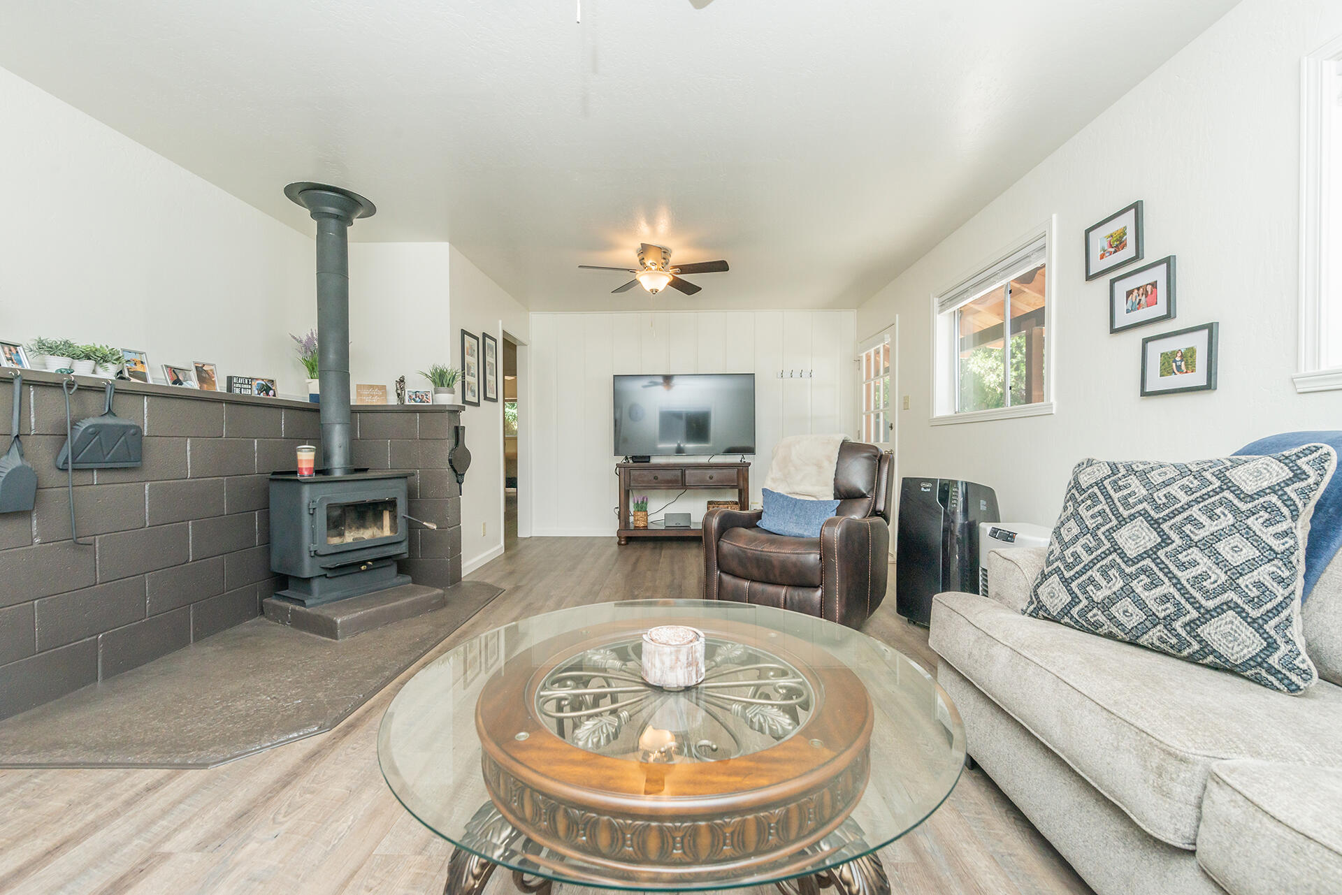 111 Scott Trinity Center Trinity Center, CA 96091 - Photo 5 of 46 a living room with furniture and a fireplace