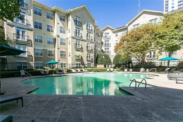 a view of a building with sitting area