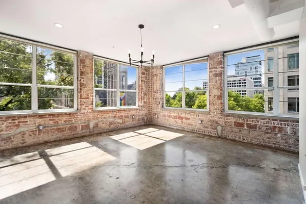 a view of an entryway with a floor to ceiling window