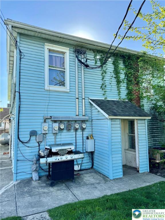 961 Main Street, Unit 2B REAR Northampton, PA 18067 - Photo 2 of 8 a backyard of a house with outdoor seating