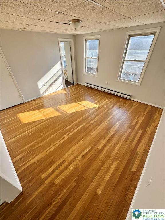 961 Main Street, Unit 2B REAR Northampton, PA 18067 - Photo 6 of 8 a view of a room with wooden floor and windows